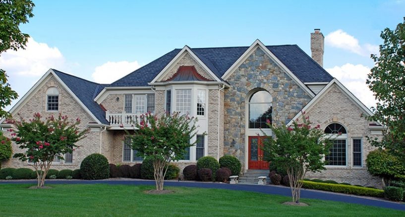 What are the major benefits of using stone veneers?